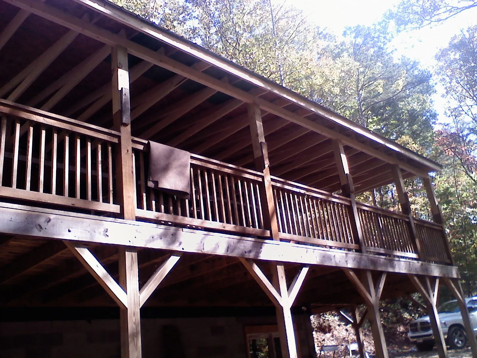 Timber framing under a new elevated porch and deck — Roof Leak Repair in Stittville by Roofing Brothers